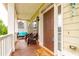Inviting front porch with seating area, creating a cozy and welcoming entrance at 3725 Falls Trl, Winston, GA 30187