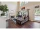 Bright living room with hardwood floors, fireplace, and backyard access at 3725 Falls Trl, Winston, GA 30187