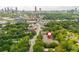 Aerial view of property highlighting location with city skyline in background at 825 Highland Ne Ln # 1116, Atlanta, GA 30306