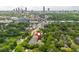Scenic aerial view shows complex and the beautiful city skyline at 825 Highland Ne Ln # 1116, Atlanta, GA 30306