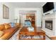 Comfortable living room with a fireplace and open layout to the kitchen at 825 Highland Ne Ln # 1116, Atlanta, GA 30306