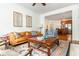 Open living room with hardwood floors, neutral paint, and an open view to the kitchen at 825 Highland Ne Ln # 1116, Atlanta, GA 30306