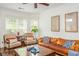 Inviting living room with neutral paint, hardwood floors, and natural lighting at 825 Highland Ne Ln # 1116, Atlanta, GA 30306