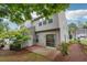 Backyard featuring a patio area and lush landscaping, perfect for outdoor enjoyment at 9165 Nesbit Ferry Rd # 9, Alpharetta, GA 30022
