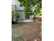 This backyard has a patio area, perfect for outdoor dining and relaxation, adding to the home's appeal at 9165 Nesbit Ferry Rd # 9, Alpharetta, GA 30022