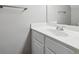 Bathroom featuring a white vanity with a clean sink and modern faucet at 9165 Nesbit Ferry Rd # 9, Alpharetta, GA 30022