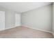Empty bedroom with gray walls, and carpeted floors at 9165 Nesbit Ferry Rd # 9, Alpharetta, GA 30022