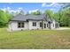 Stylish single-story home with white siding, dark trim, and a well-maintained yard at 110 Beaver Pointe, Villa Rica, GA 30180