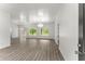 Bright, open living space with hardwood floors and large windows offering scenic views at 110 Beaver Pointe, Villa Rica, GA 30180