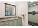 Stylish bathroom with a modern vanity, granite countertops, and a glass-enclosed shower at 19 Margrit Ct, Stockbridge, GA 30281