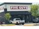 Exterior view of Five Guys restaurant, with customer parking at 19 Margrit Ct, Stockbridge, GA 30281