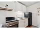Efficient kitchen features stainless appliances and ample counter space at 19 Margrit Ct, Stockbridge, GA 30281