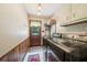 Convenient laundry room with side-by-side washer and dryer units at 19 Margrit Ct, Stockbridge, GA 30281