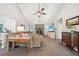 Bright living room with a vaulted ceiling, fireplace, and open layout perfect for relaxation and entertaining at 19 Margrit Ct, Stockbridge, GA 30281
