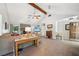 Open living area featuring vaulted ceilings, fireplace, and hardwood floors at 19 Margrit Ct, Stockbridge, GA 30281