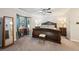 Inviting main bedroom with a ceiling fan, and a comfortable sitting area at 19 Margrit Ct, Stockbridge, GA 30281