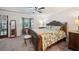 Bright and airy main bedroom with a ceiling fan, and neutral-toned decor at 19 Margrit Ct, Stockbridge, GA 30281