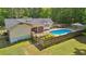 Spacious backyard featuring an in-ground swimming pool and fenced perimeter at 19 Margrit Ct, Stockbridge, GA 30281