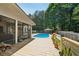Beautiful backyard featuring a screened porch and a sparkling in-ground pool at 19 Margrit Ct, Stockbridge, GA 30281