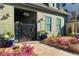 Inviting facade of the leasing office featuring manicured landscaping and beautiful flower planters at 3316 Stillwood Ln, Atlanta, GA 30354