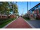 A brick-paved pedestrian walkway lit by string lights creating a charming nighttime ambiance at 3316 Stillwood Ln, Atlanta, GA 30354