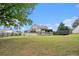 Large backyard with an above ground pool and deck, great for outdoor activities at 35 Kendall Ln, Covington, GA 30014