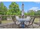 Outdoor deck with seating, perfect for relaxing or entertaining, and views of the backyard at 35 Kendall Ln, Covington, GA 30014