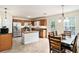 Well-lit kitchen and dining area with stainless steel appliances and an inviting dining table at 35 Kendall Ln, Covington, GA 30014