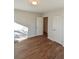 A well-lit bedroom features two closets, a window, and light-colored walls at 3601 Orchard Cir, Decatur, GA 30032