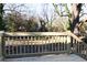 Newly constructed wooden deck, with views of the bare wooded back yard at 3601 Orchard Cir, Decatur, GA 30032