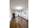 An open floor plan connects the living and dining area with modern laminate flooring at 3601 Orchard Cir, Decatur, GA 30032