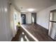 Open living area with hardwood flooring and a view of the kitchen at 3601 Orchard Cir, Decatur, GA 30032