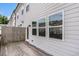 Back of house with fenced-in deck and windows at 1624 Venture Point Way, Decatur, GA 30032