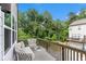 Relaxing balcony featuring comfortable seating with scenic views of the surrounding greenery at 1624 Venture Point Way, Decatur, GA 30032