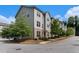 View of the townhome's exterior highlighting the architecture, landscaping, and neighborhood charm at 1624 Venture Point Way, Decatur, GA 30032
