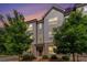 Charming townhome with brick accents and manicured landscaping, offering a welcoming curb appeal at 1624 Venture Point Way, Decatur, GA 30032