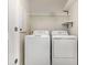 Convenient laundry room features a side-by-side washer and dryer at 1624 Venture Point Way, Decatur, GA 30032