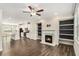 Inviting living room with a fireplace, built-in shelves, and an open floor plan at 1624 Venture Point Way, Decatur, GA 30032