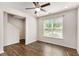 Neutral living room features hardwood floors and a large window at 1624 Venture Point Way, Decatur, GA 30032