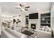Spacious living room featuring a fireplace, built-in shelving, and comfortable seating arrangement at 1624 Venture Point Way, Decatur, GA 30032