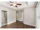 Expansive main bedroom features tray ceiling, wood floors and an ensuite bath at 1624 Venture Point Way, Decatur, GA 30032