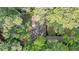 Aerial view of a home nestled in a green, tree-lined neighborhood at 3521 Eaglerock Dr, Atlanta, GA 30340