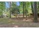 Large, private backyard with a hammock and plenty of space for recreation and relaxation in a natural setting at 3521 Eaglerock Dr, Atlanta, GA 30340