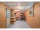 Basement featuring pegboard walls and shelves at 3521 Eaglerock Dr, Atlanta, GA 30340