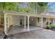 Convenient carport adjacent to the home, providing covered parking and easy access to the front porch at 3521 Eaglerock Dr, Atlanta, GA 30340