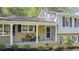 Charming front porch with brick accents, comfortable seating, and tasteful landscaping enhancing curb appeal at 3521 Eaglerock Dr, Atlanta, GA 30340