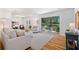 Bright living room showcasing hardwood floors and an inviting view of the backyard at 3521 Eaglerock Dr, Atlanta, GA 30340