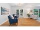 Stylish sitting area with hardwood floors, French doors, and ample natural light at 3521 Eaglerock Dr, Atlanta, GA 30340
