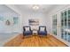 Charming sitting area with hardwood floors, natural light, and a seamless transition to other living spaces at 3521 Eaglerock Dr, Atlanta, GA 30340