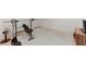 Basement featuring workout equipment, a fan and flooring at 3805 Carder Ln, Cumming, GA 30028